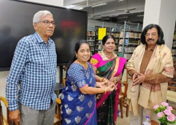Teacher honoured by library