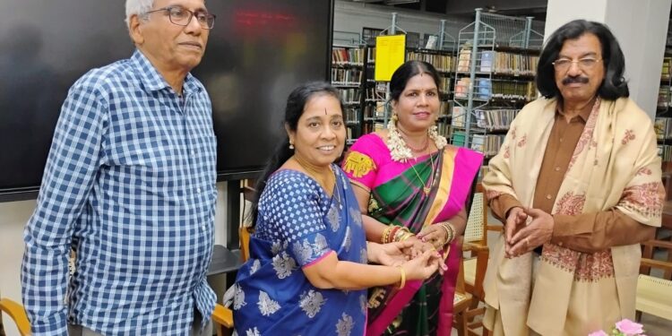 Teacher honoured by library