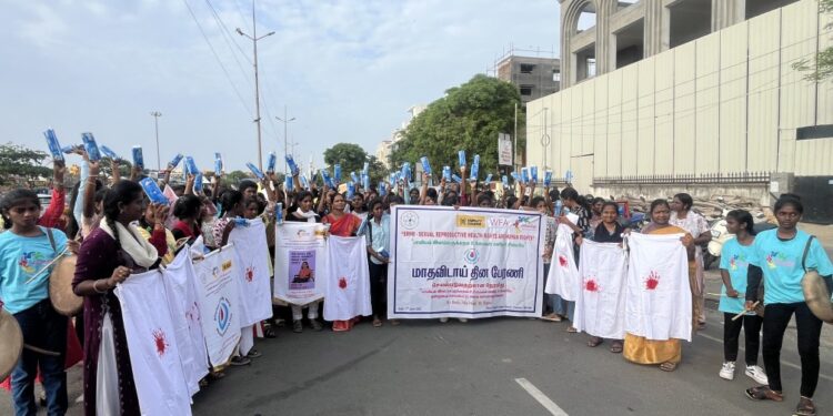 Adolescent girls lead Menstrual Hygiene Day rally at Elliot’s Beach